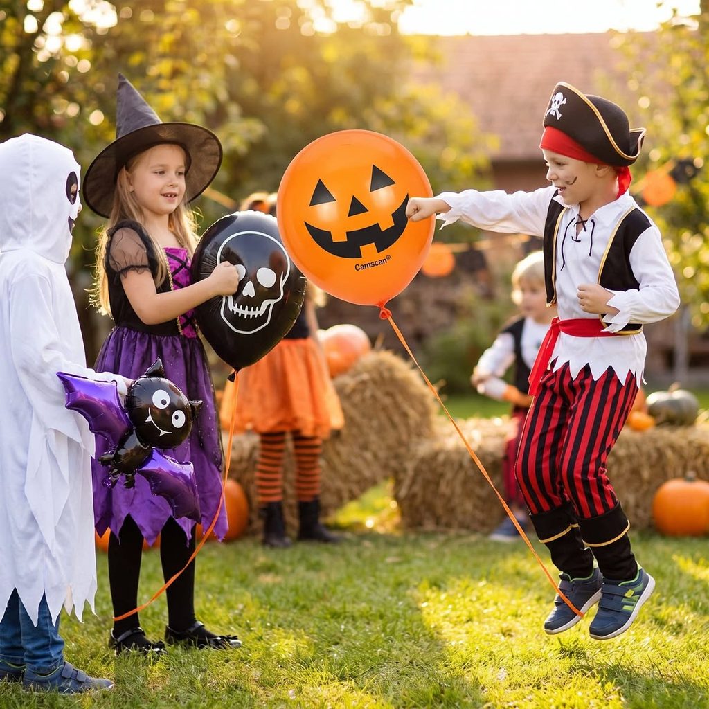 kids playing balloon pumpkin toss game