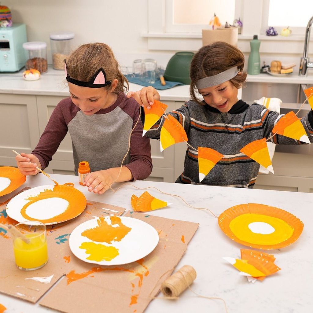 kids making candy corn craft
