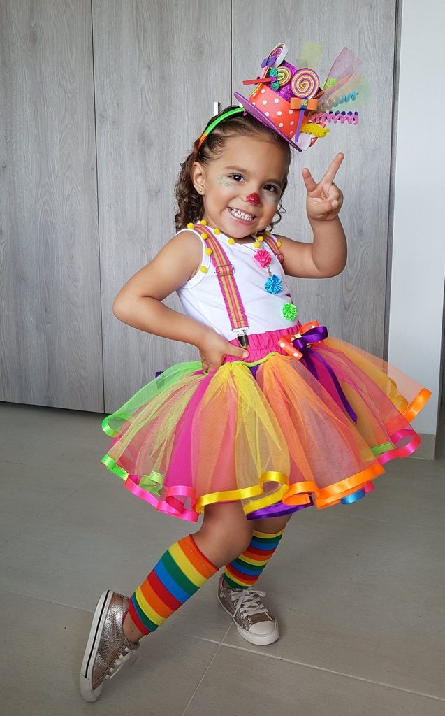 kid in clown costume
