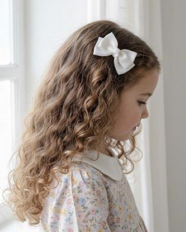 loose waves as one of halloween hairstyles for little girls