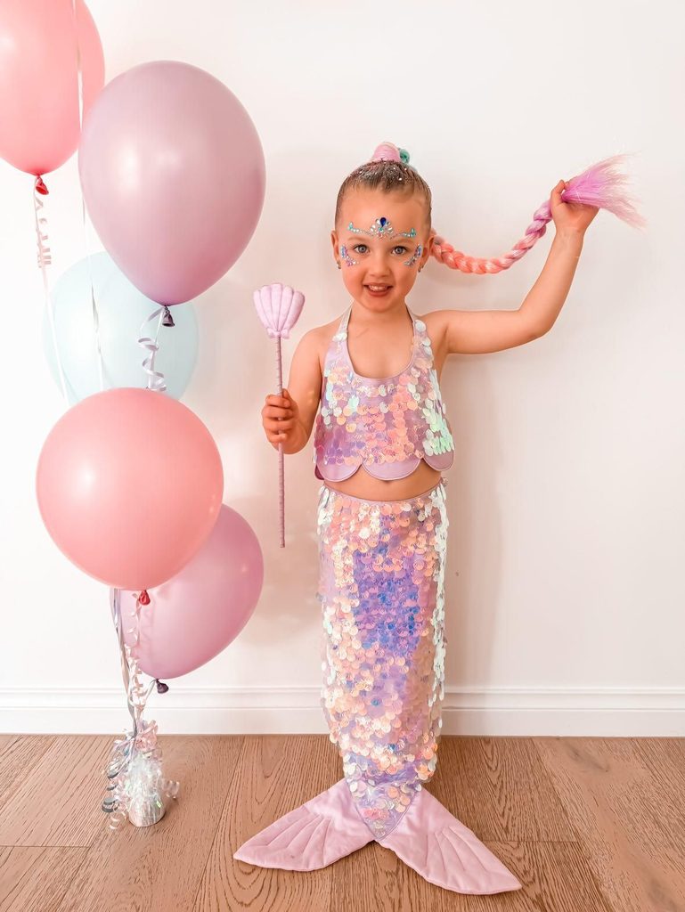 kid in mermaid costume