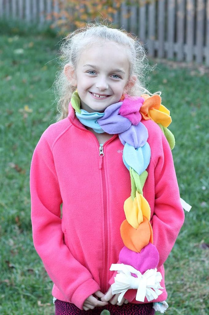 kid with no sew fleece scarf