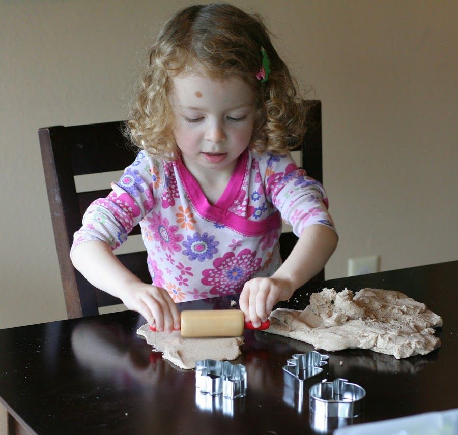 kid making salt dough pumpkin