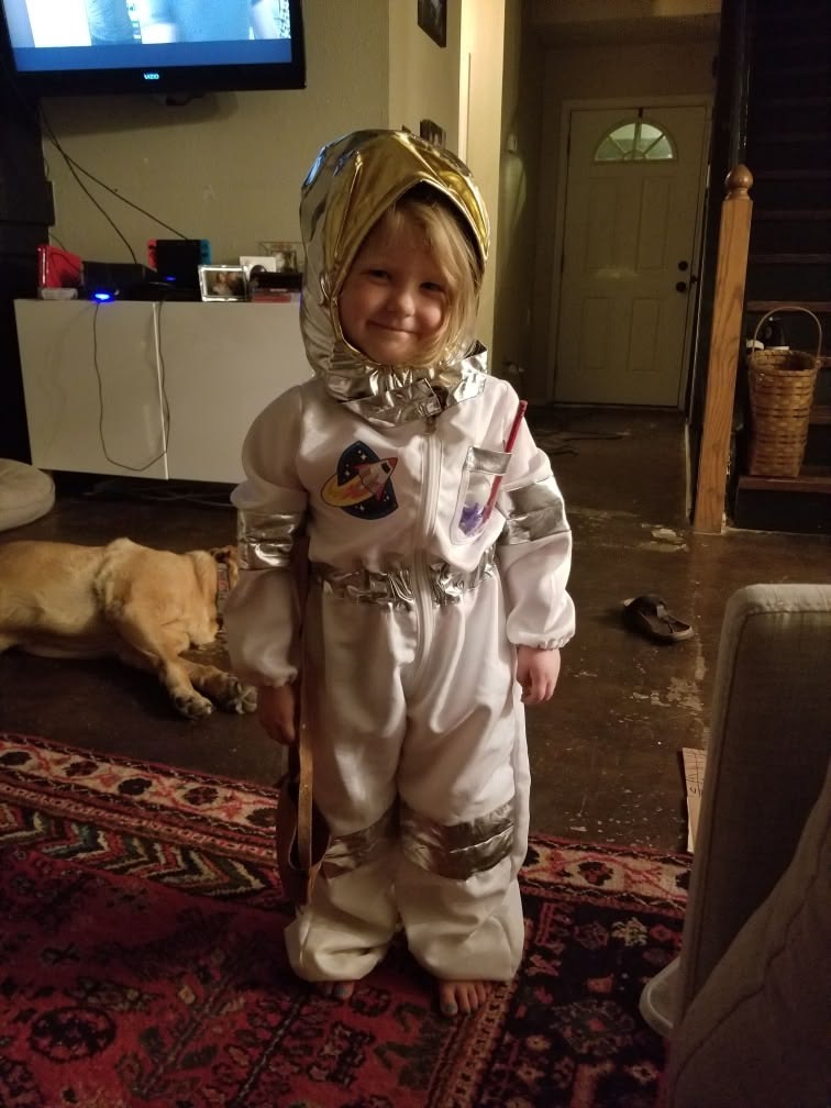 kid in pilot costume