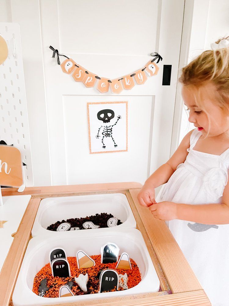 kid in sensory bin