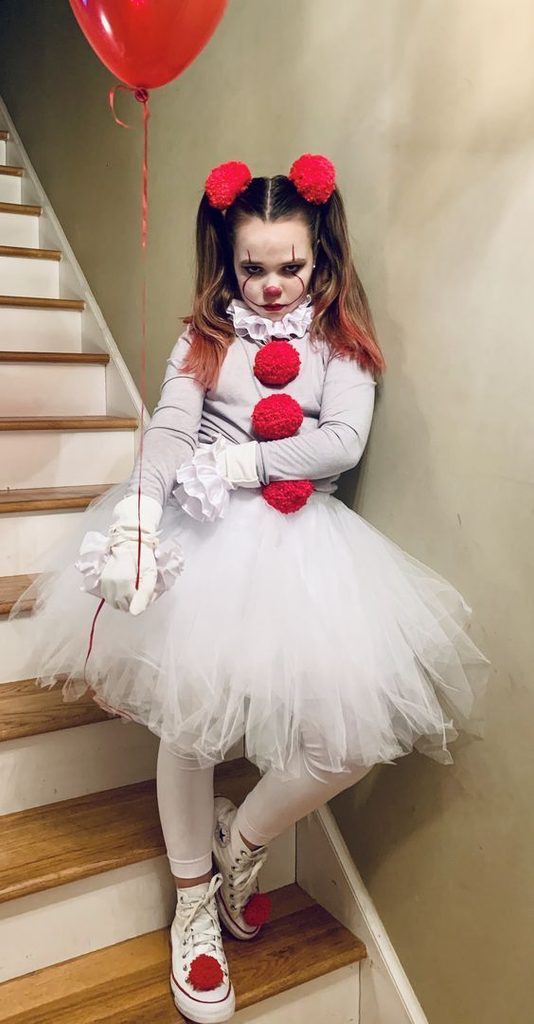 kid in halloween costume