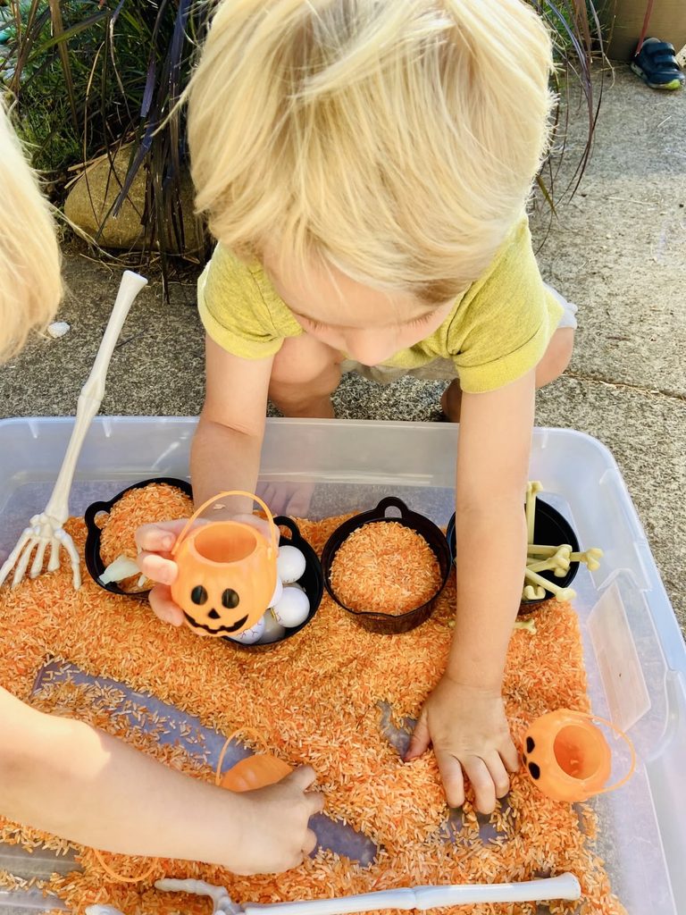 kid digging a bin