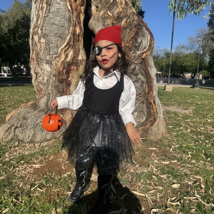 kid wearing long sleeve shirt inside a costume as one of the things to wear under a halloween costume