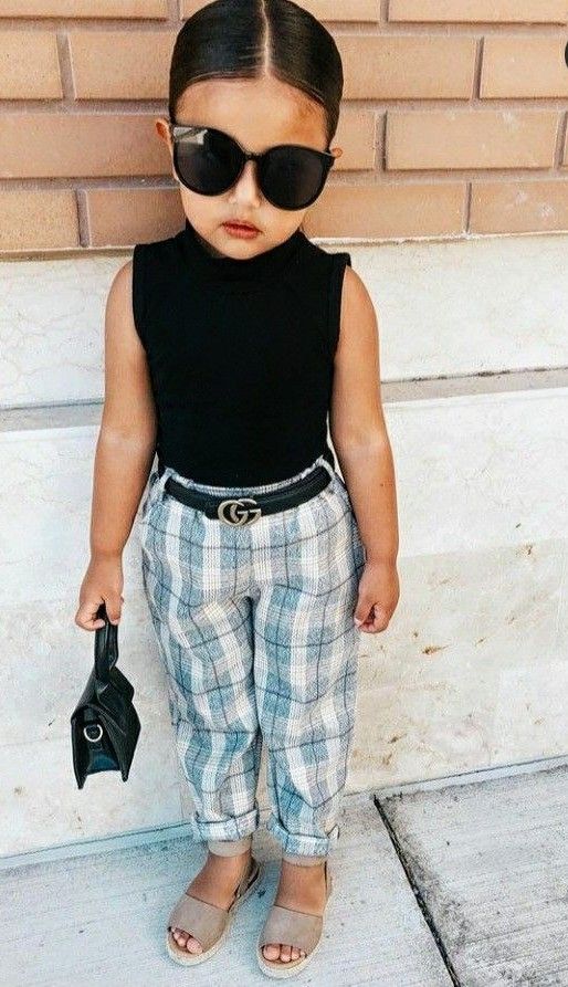 kid in a straight pant and a tank as one of kids everyday outfits