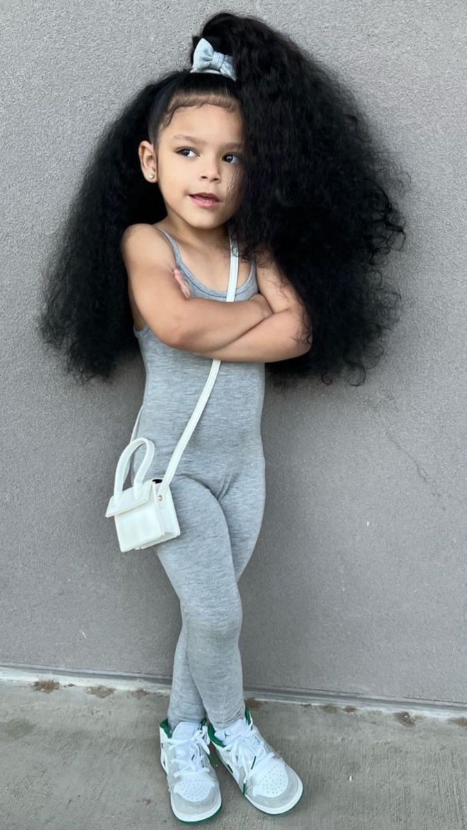 kid with a long hair
