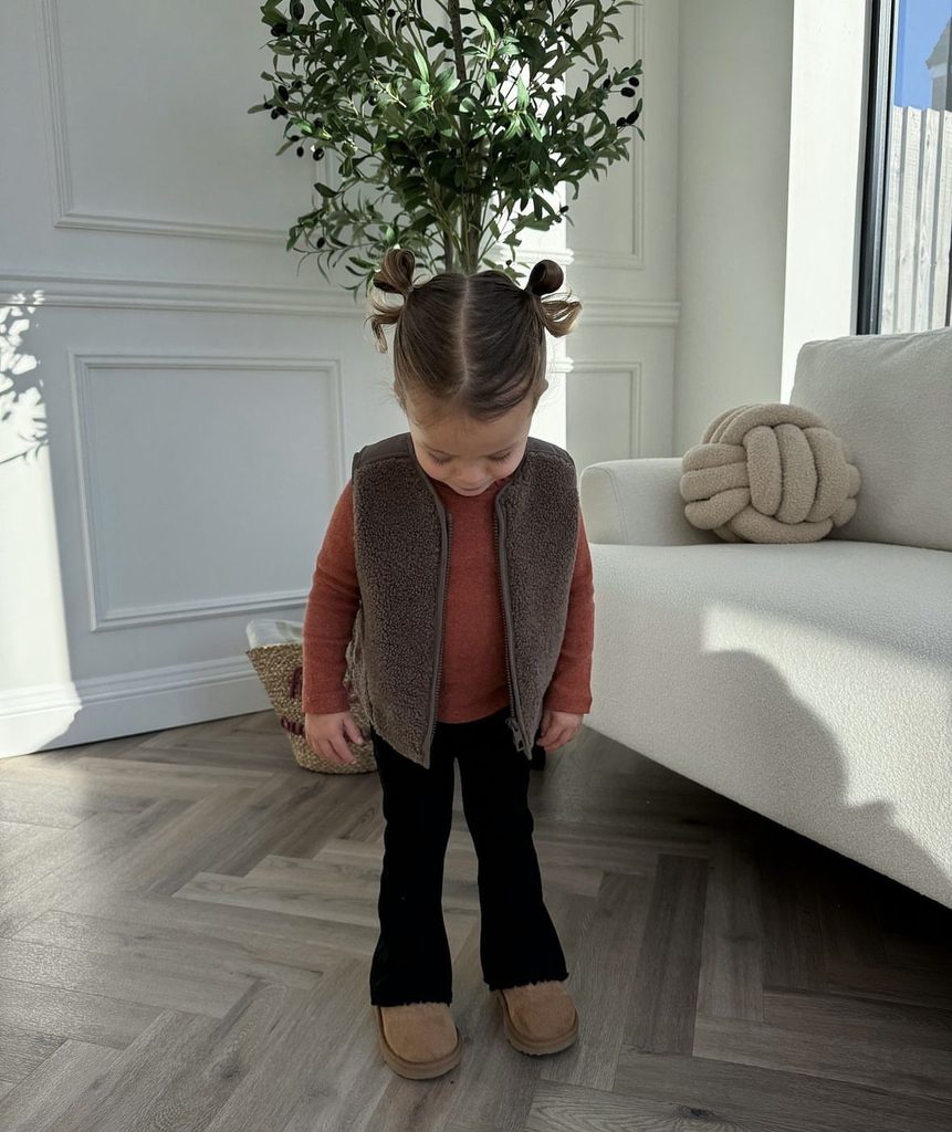 kid with protective hairstyle