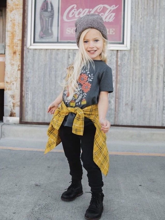 kid that tied jacket on her waist