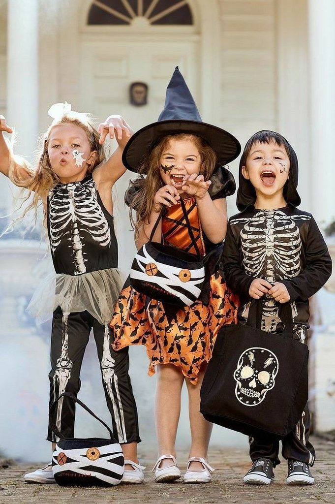 kids pronouncing their costume name as a way to expand their vocabulary as part of halloween learning activities for kids