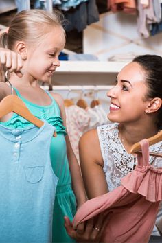 mom and kids checking out clothes from kids capsule wardrobe
