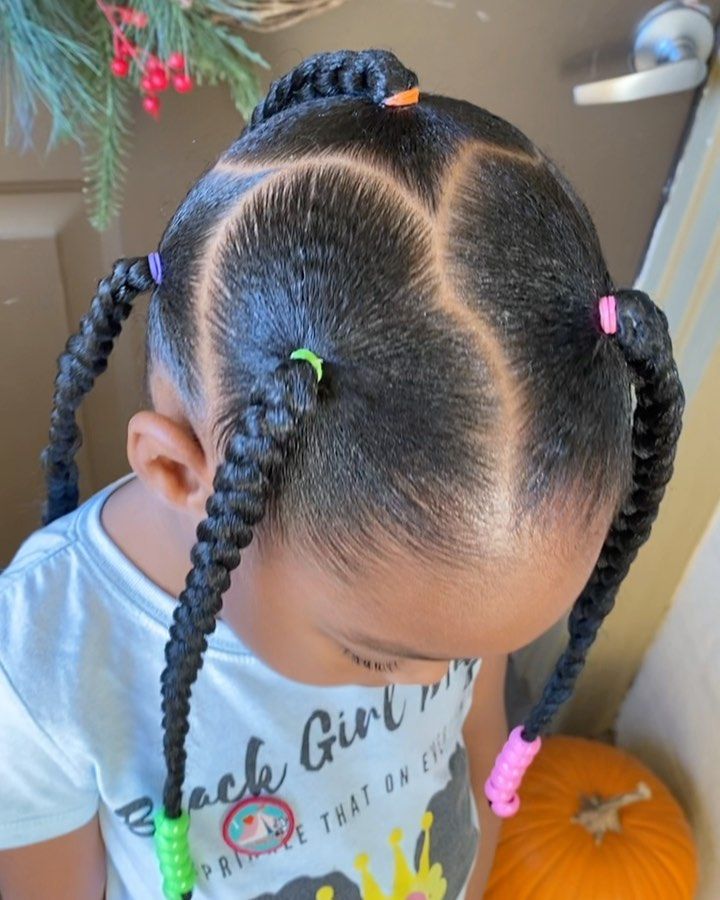 kid with a nice braids and beads