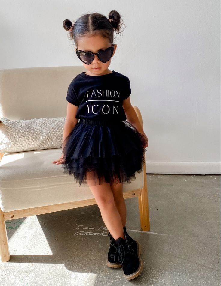 kid in all black outfit
