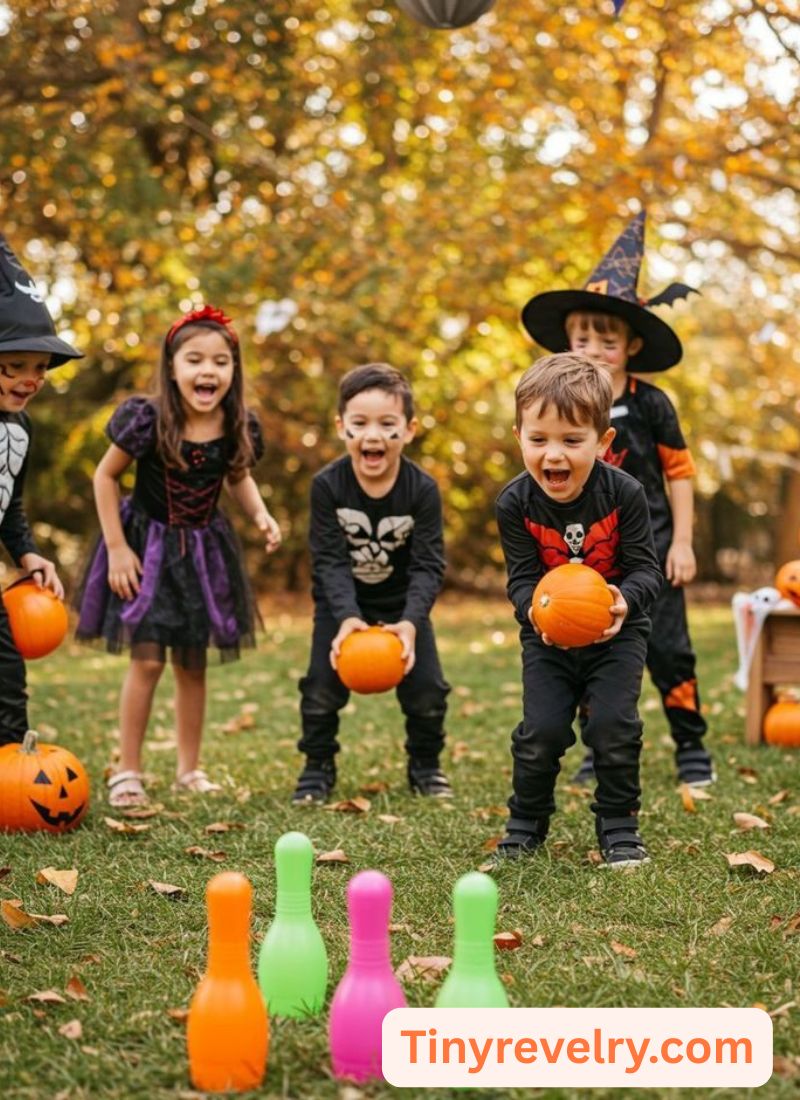 kids playing pumpkin bowling game outdoor